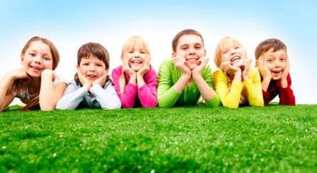 2020People Children Smiling kids lie on the green grass 144792 